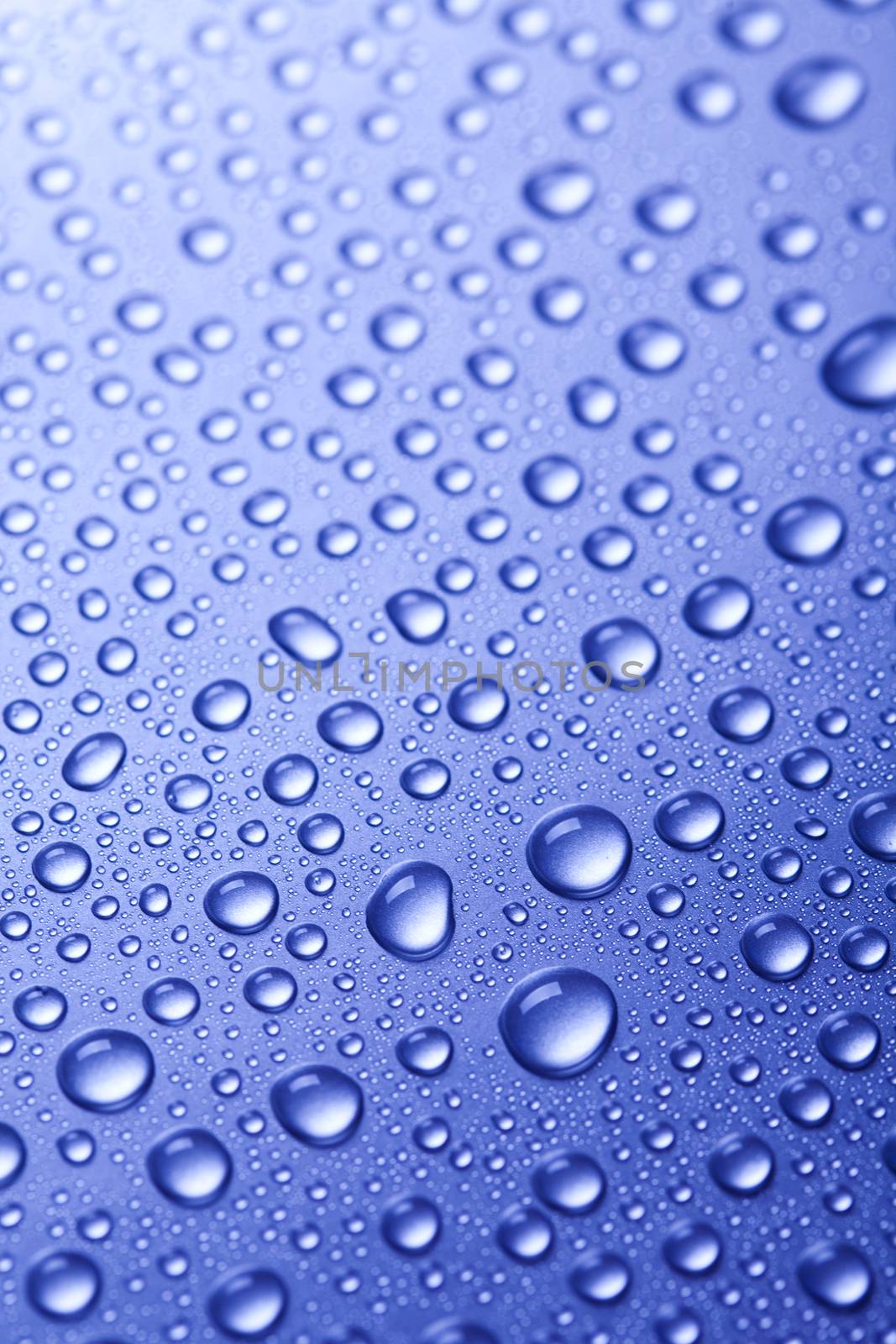 Ice cubes on blue background