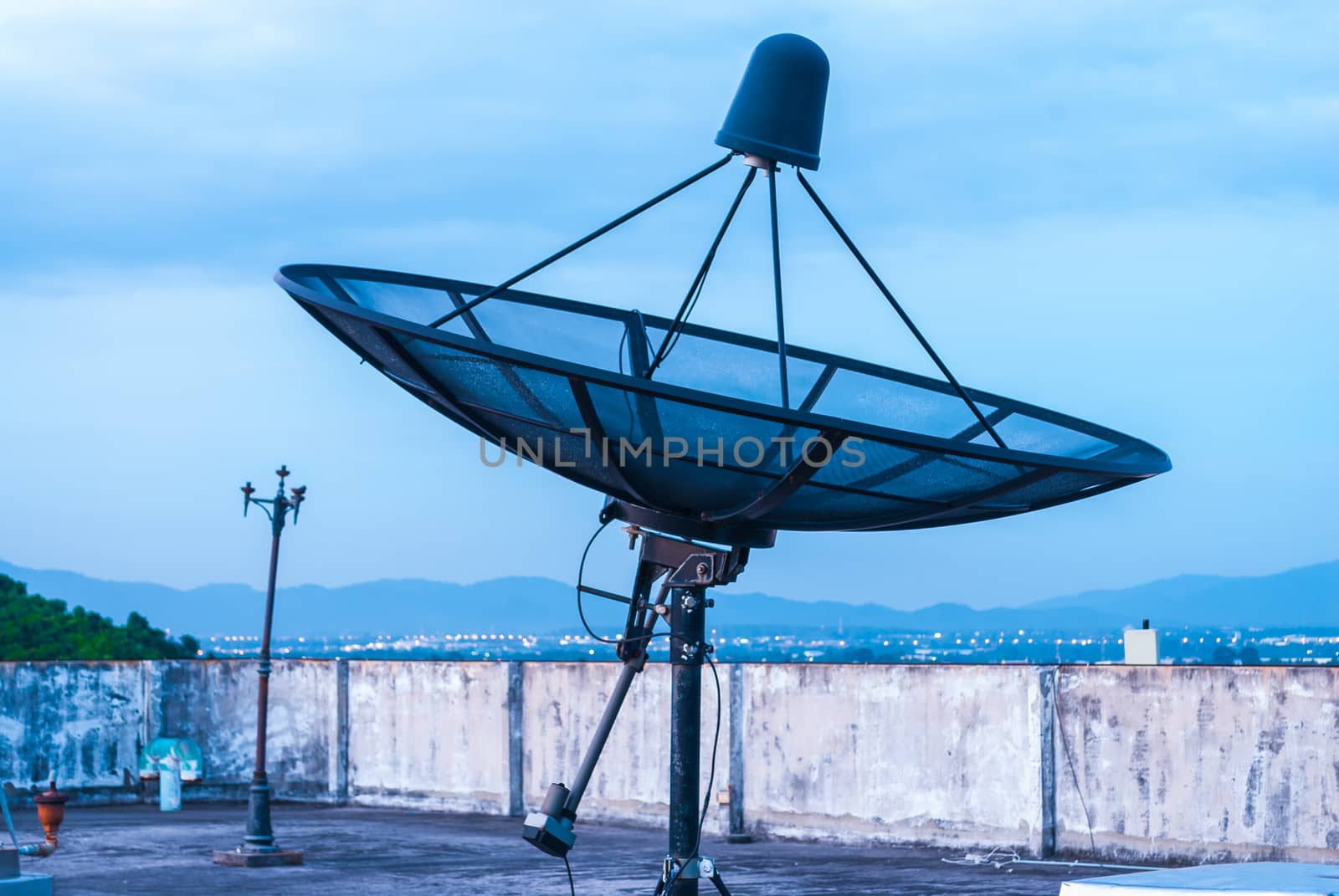 Satellite Dish on the Rooftop by noneam