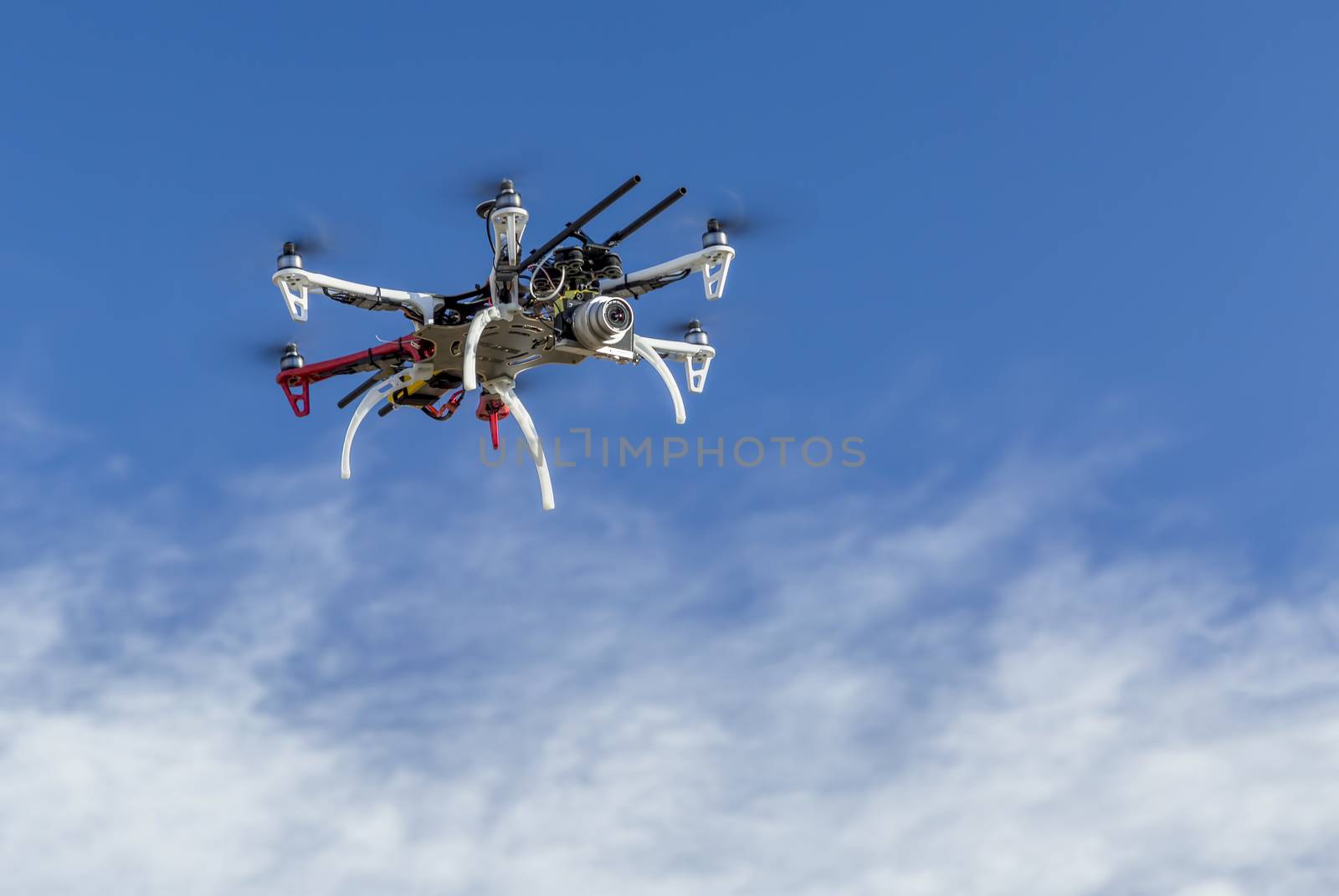 FORT COLLINS, CO, USA, December 2,  2014:  DJI  F550 Flame Wheel  hexacopter drone, assembled from a kit, flying with a small prosumer camera.