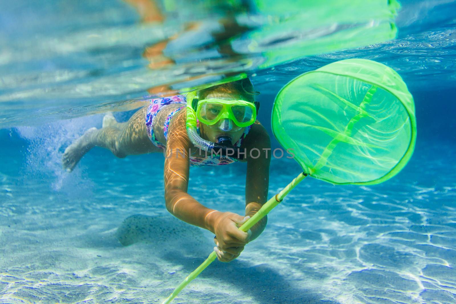 Underwater girl snorkeling by maxoliki
