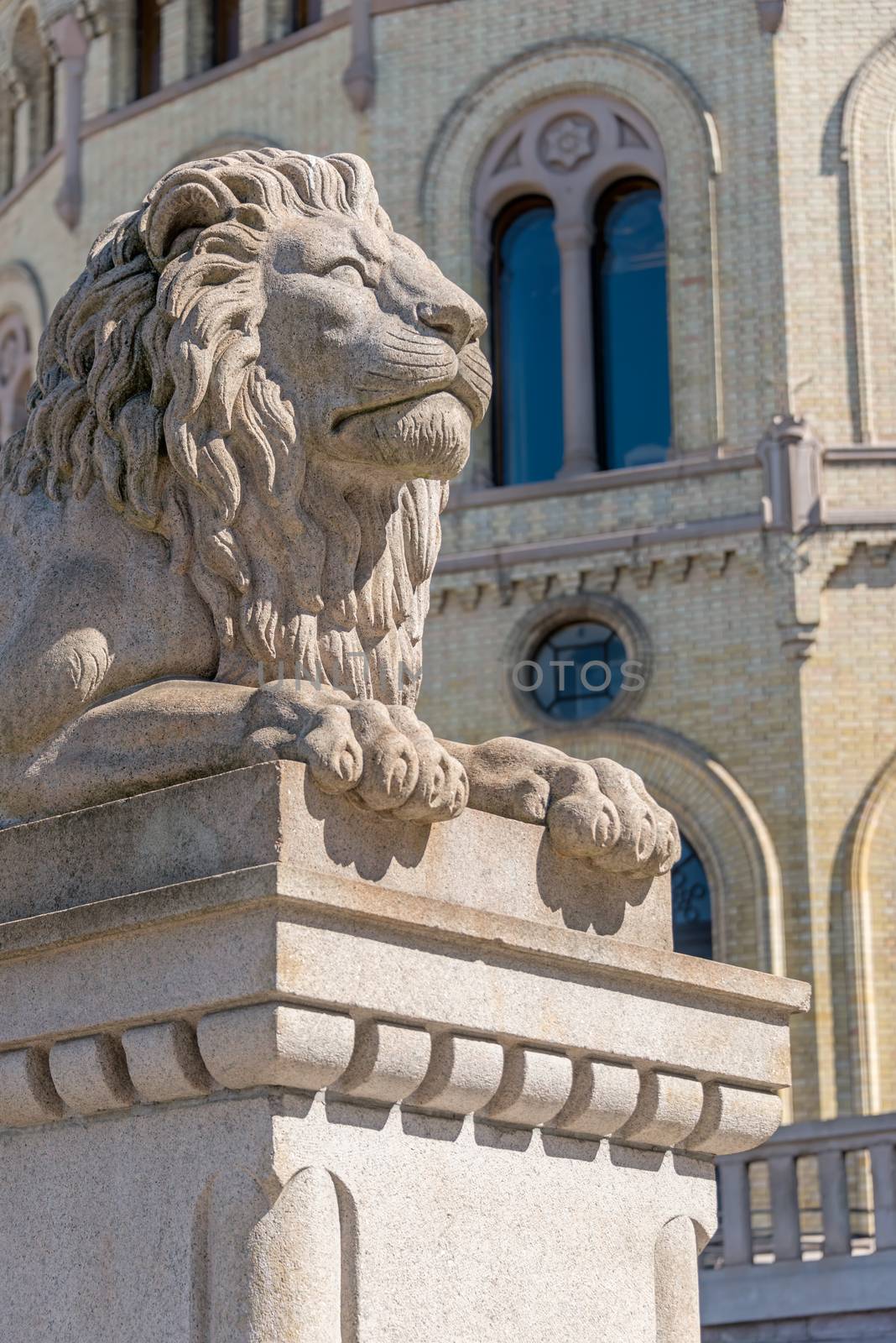 Exterior of the Parliament of Norway in Oslo, Norway. Lion is symbol of power