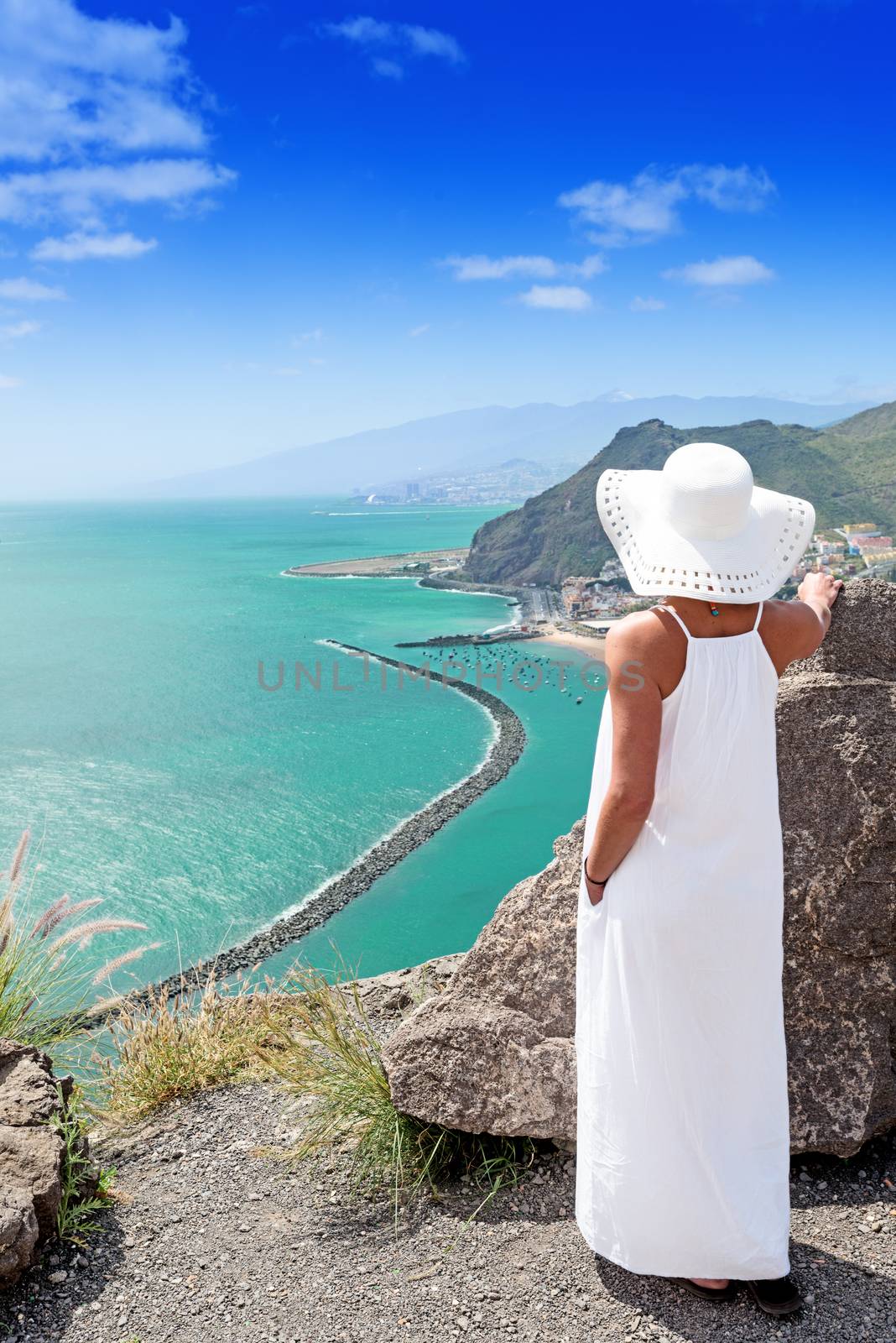 Lonely woman looking on scenic view at Tenerife, Teide volcano on background