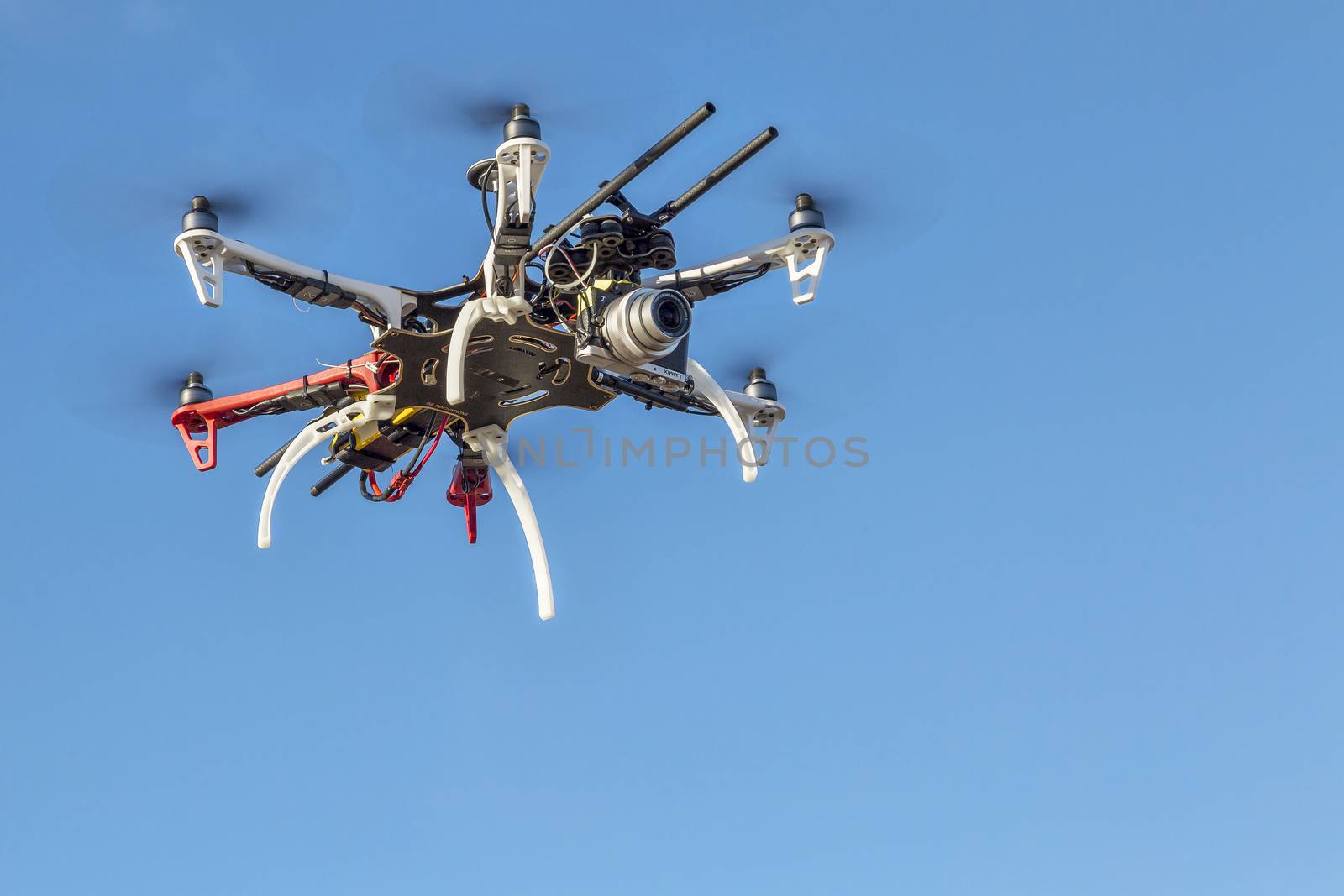 FORT COLLINS, CO, USA, December 2,  2014:  DJI  F550 Flame Wheel  hexacopter drone, assembled from a kit, flying with a small prosumer camera.