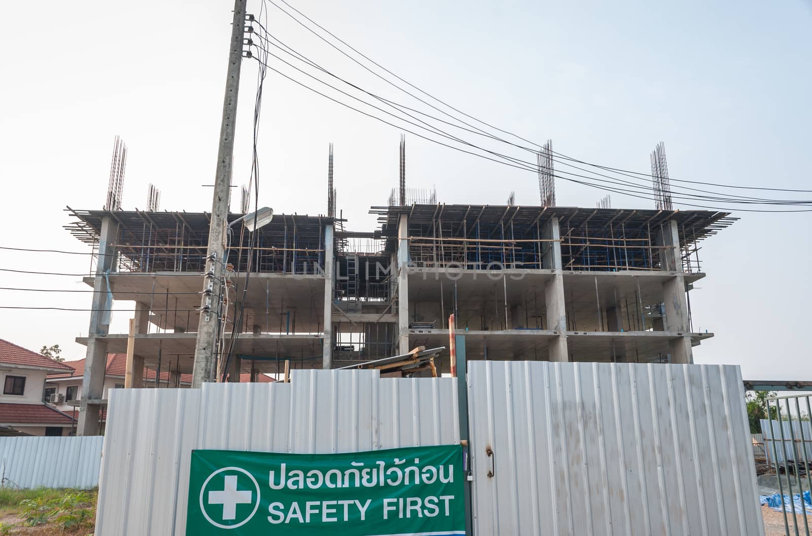 Closed Construction Site with Safety First Sign in Thai.