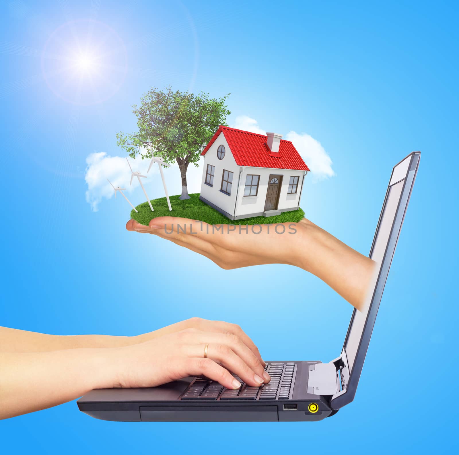 White shack in hand with red roof and chimney of screen laptop.  Background sun shines brightly on left by cherezoff