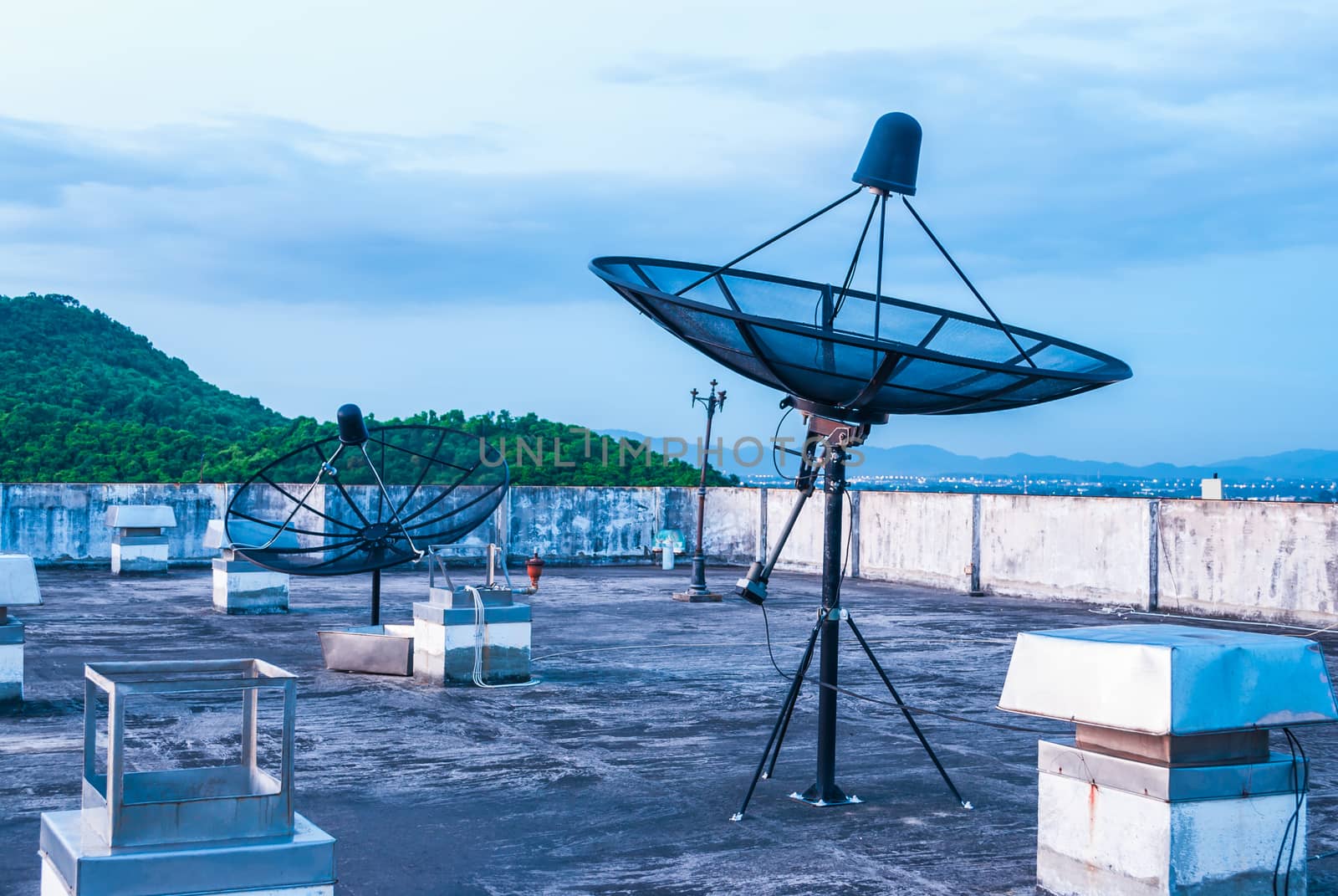 Satellite Dishes on the Rooftop by noneam