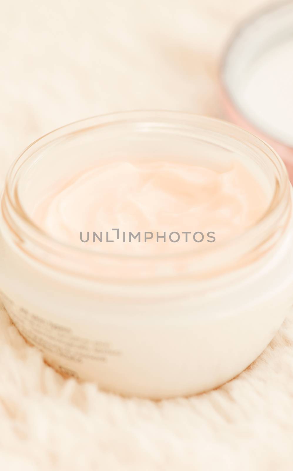 Cosmetic cream in jar close up by Nanisimova
