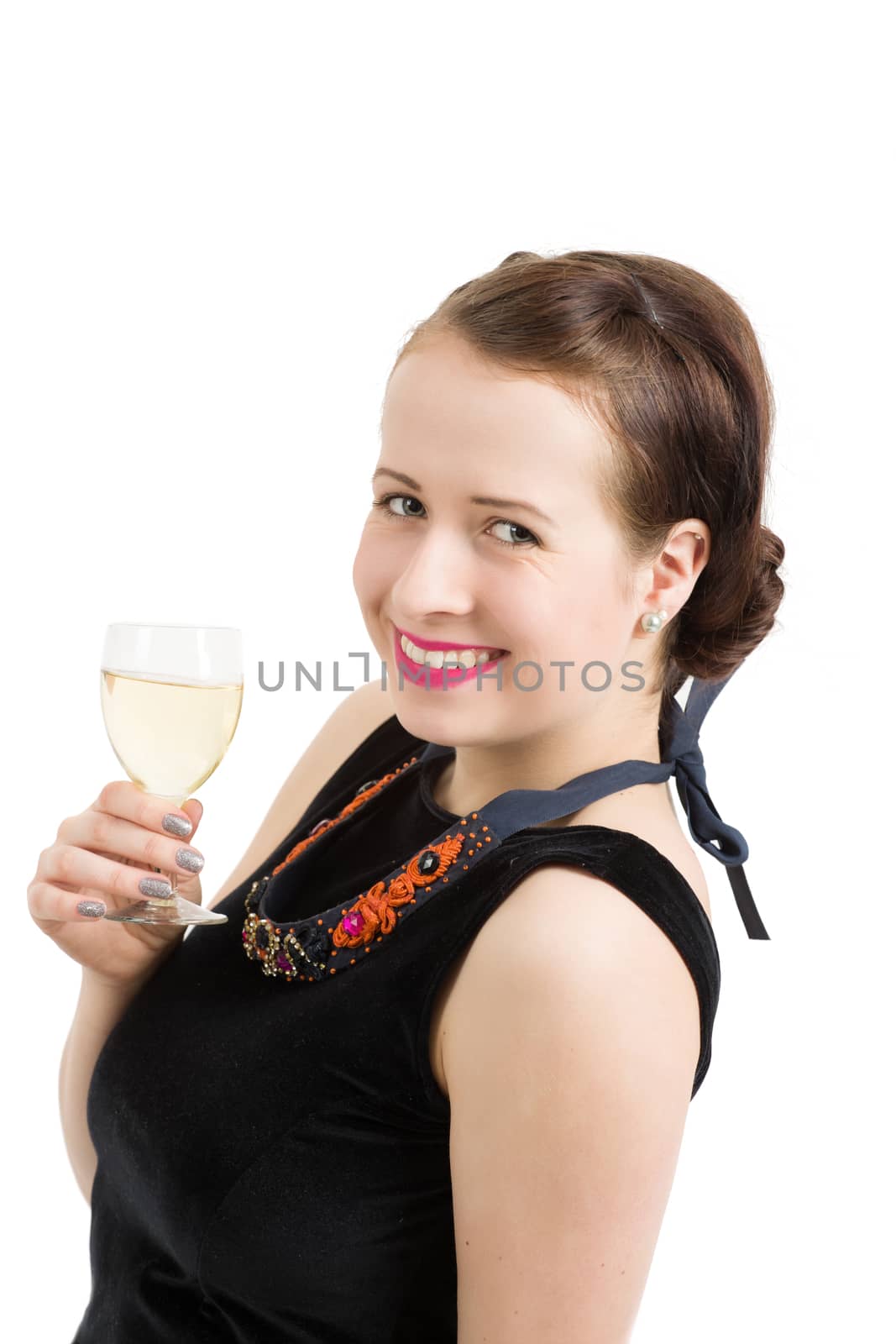 Studio portrait of a beautiful young brunette woman holding a glass of white wine, isolated on white