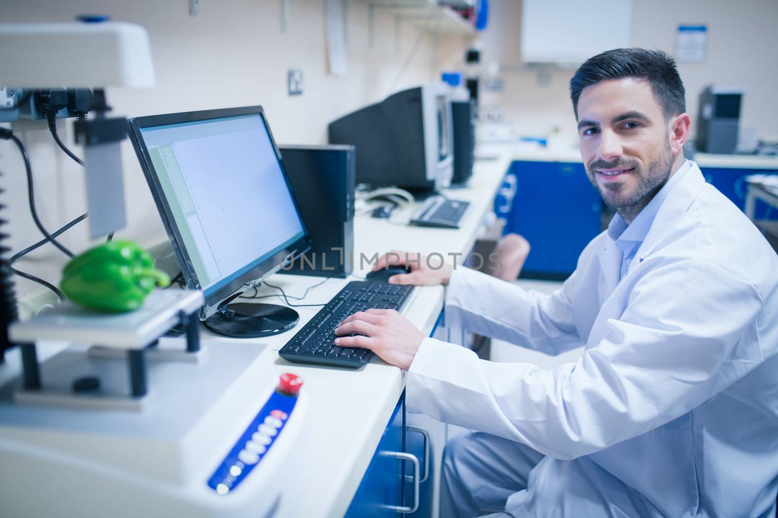 Food scientist using technology to analyse pepper by Wavebreakmedia