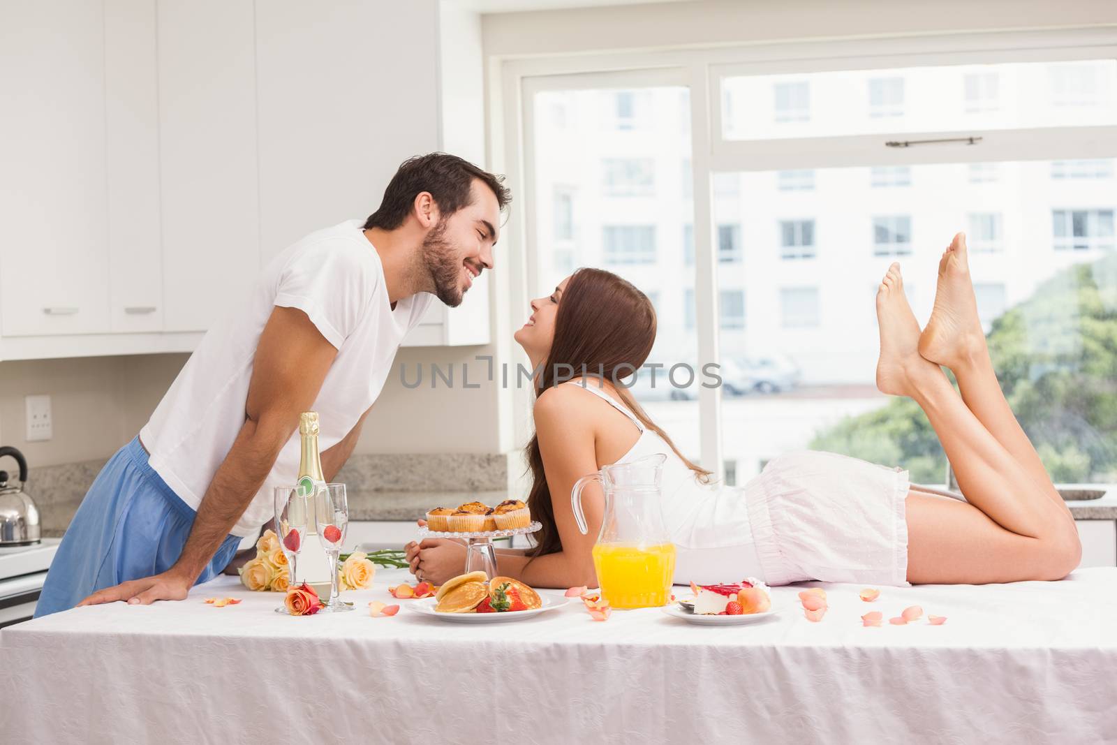 Young couple having a romantic breakfast by Wavebreakmedia