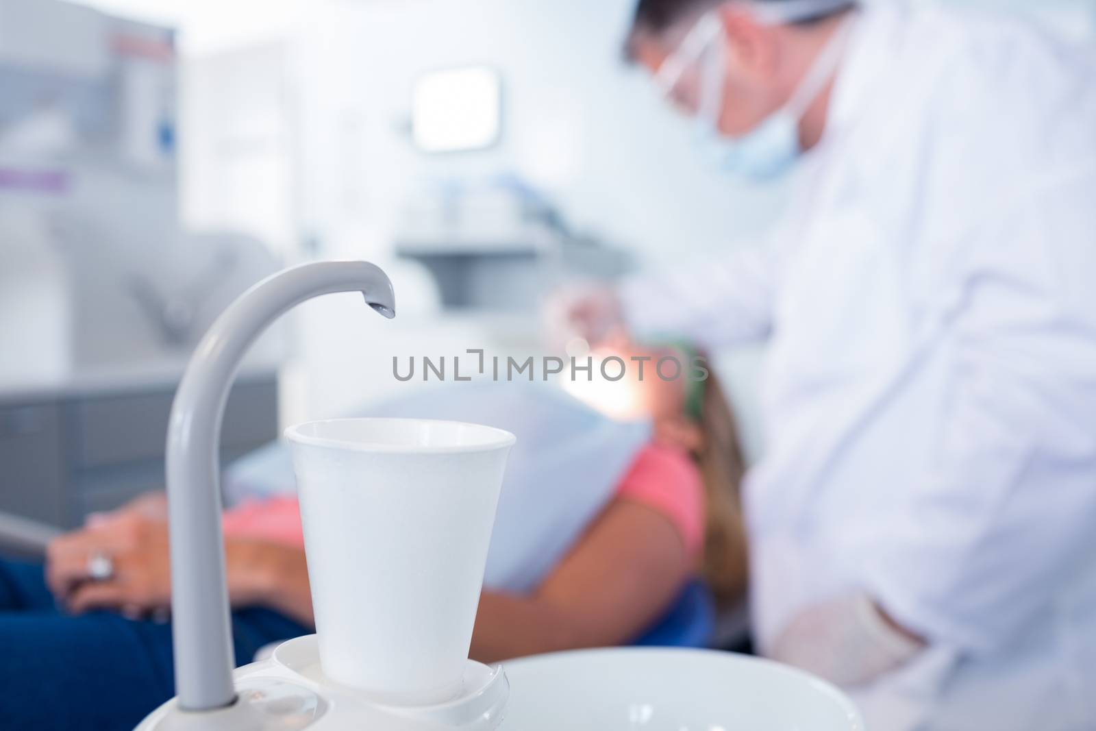 Close up of a cup under the sink at the dental clinic