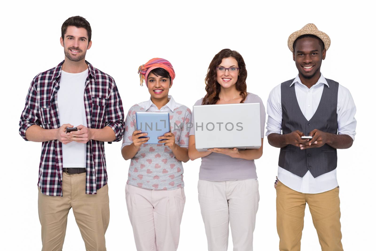 Smiling coworkers with technology posing on white background