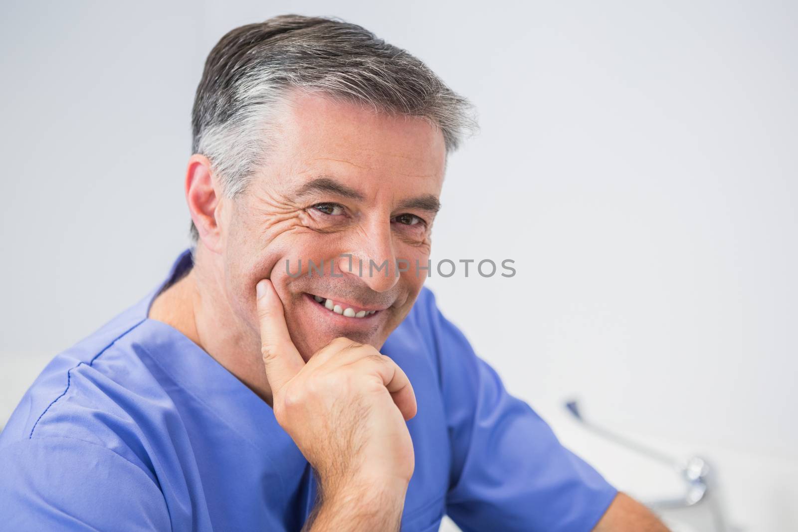 Portrait of a cheerful dentist by Wavebreakmedia