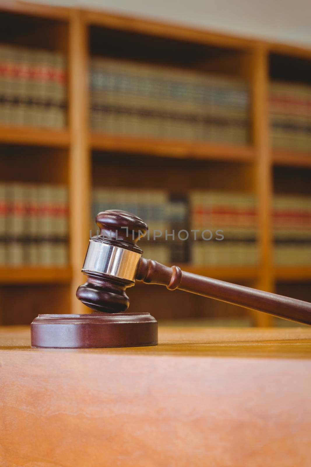 Gavel resting on sound block in library