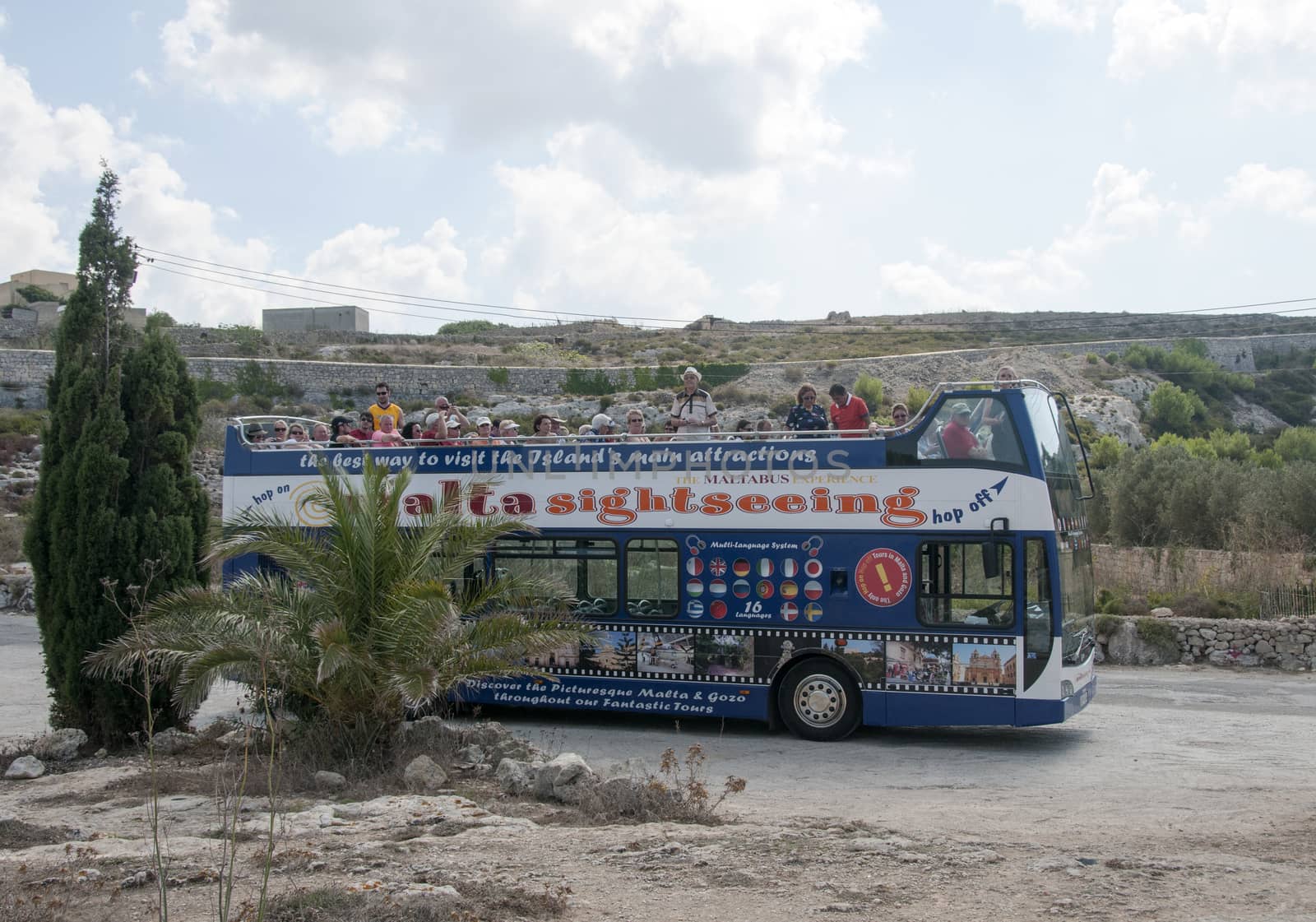 VALETTA,MALTA-AUGUST 29, 2011: People enjoy vacation on the island Malta in the bus, on August 29 2011, the bus is sightseeing bus that tours around the island for tourists