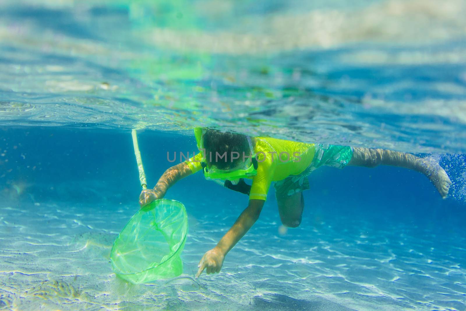 Underwater boy snorkeling by maxoliki