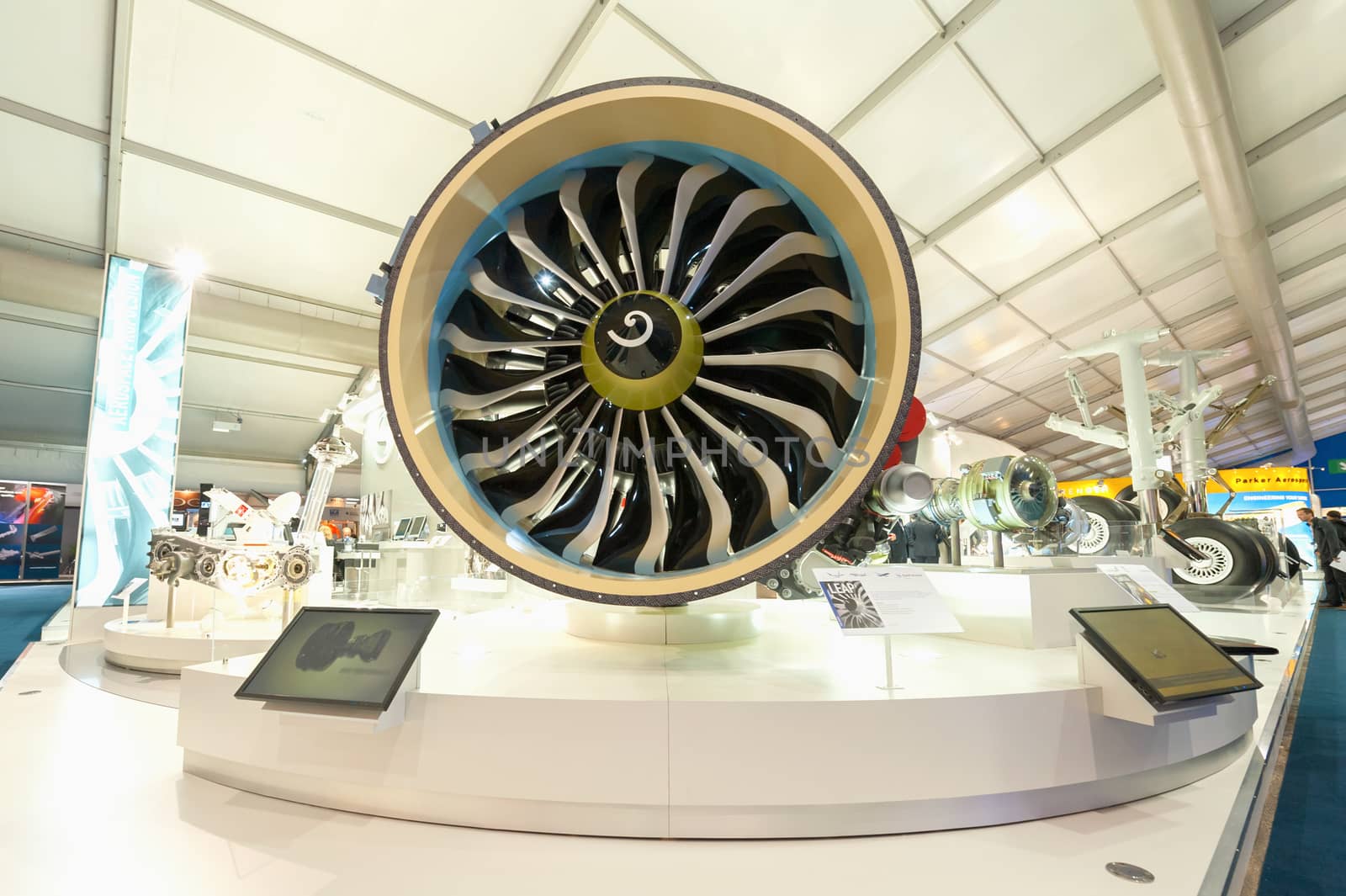 Farnborough, UK - July 12, 2012: Exhibition stands displaying jet engines and other components used in the aviation industry at Farnborough International Airshow, UK