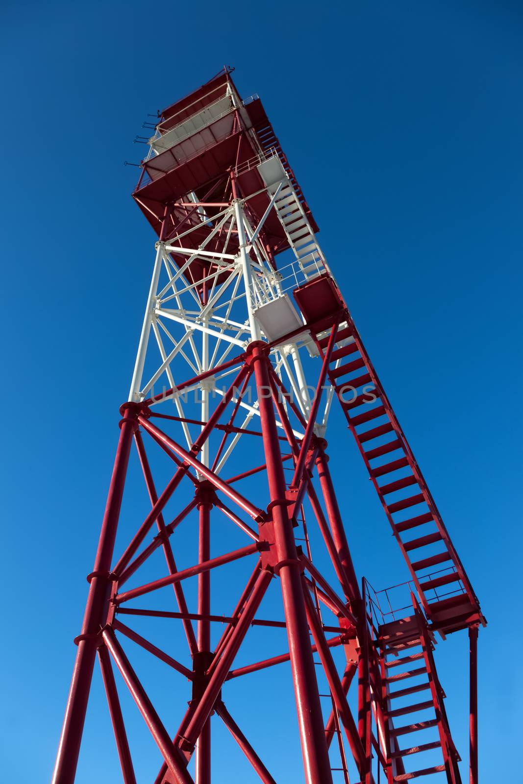 Modern marine tower against the blue sky