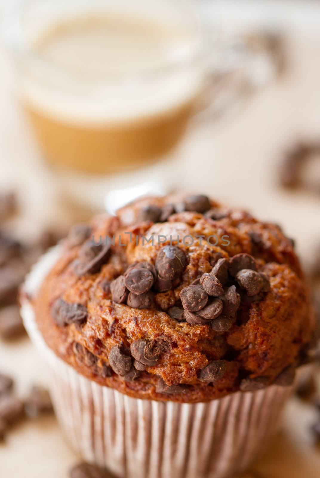 Chocolate a muffin near the coffee latte