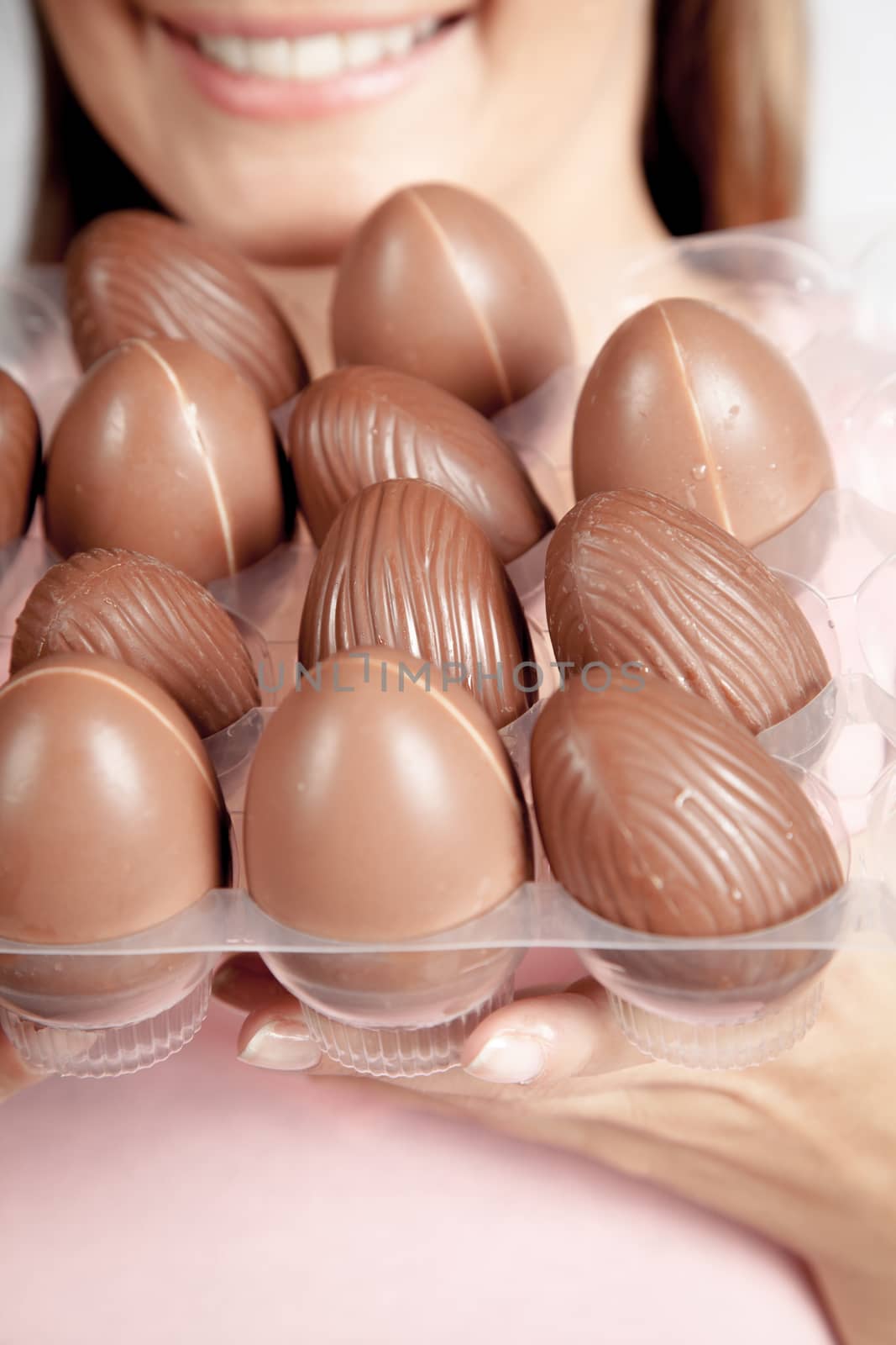 20-25, background, caucasian, decoration, easter, egg, event, felicity, female, giving, hand, handmade, happy, holding, hope, human, life, model, old, one, palm, people, person, portrait, property, releases, seasonal, show, showing, smile, smiling, studio, symbol, traditional, white, woman, years, young
