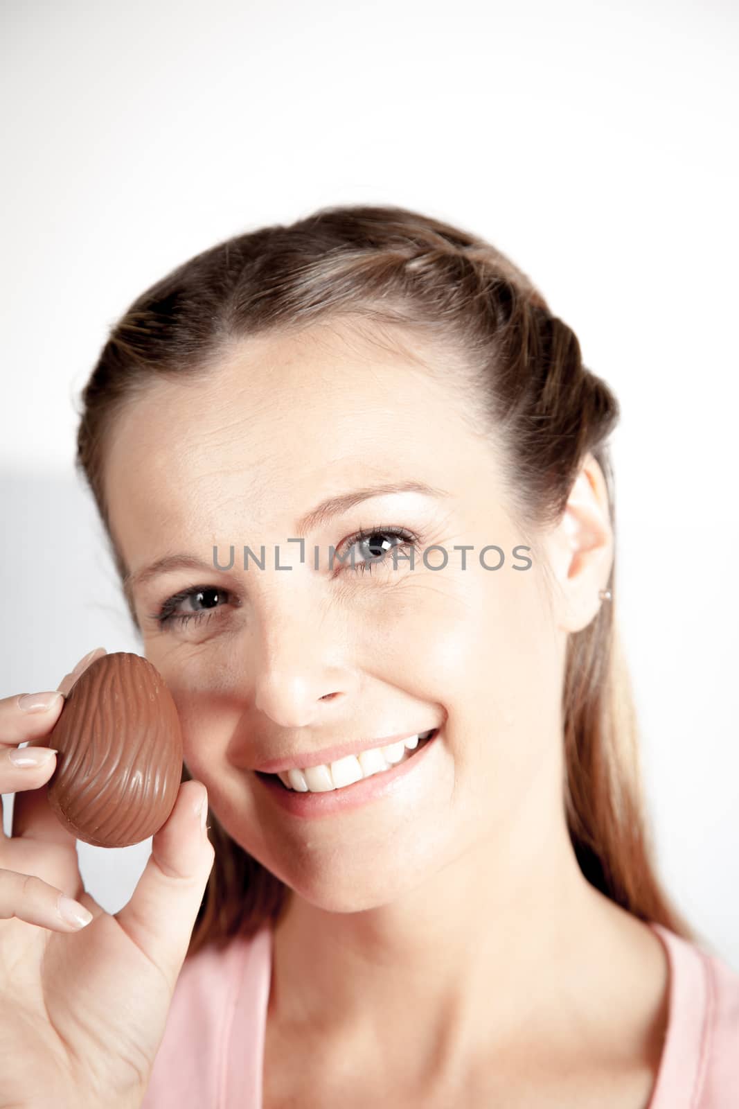 20-25, background, caucasian, decoration, easter, egg, event, felicity, female, giving, hand, handmade, happy, holding, hope, human, life, model, old, one, palm, people, person, portrait, property, releases, seasonal, show, showing, smile, smiling, studio, symbol, traditional, white, woman, years, young