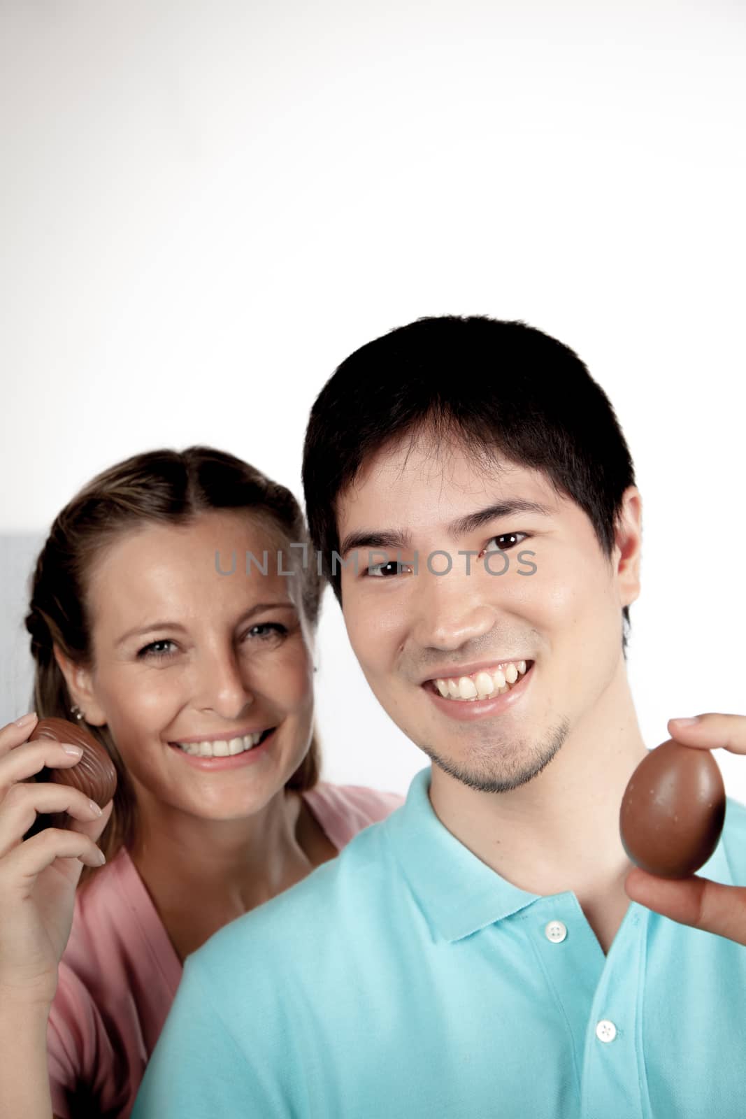 20-25, asian, background, caucasian, Couple, covering, decoration, easter, egg, event, felicity, female, giving, hand, handmade, happy, holding, hope, human, life, love, man, model, old, one, palm, people, person, portrait, property, releases, seasonal, show, showing, smile, smiling, studio, surprise, symbol, together, traditional, white, woman, years, young
