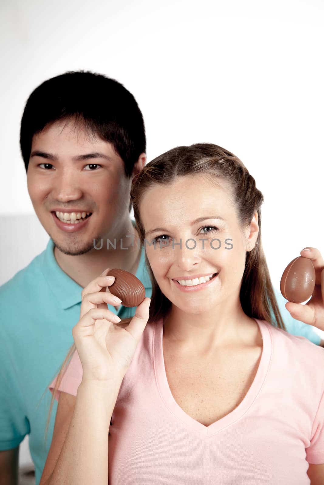 20-25, asian, background, caucasian, Couple, decoration, easter, egg, event, felicity, female, giving, hand, handmade, happy, hold, holding, hope, human, life, love, man, model, old, one, palm, people, person, portrait, property, releases, seasonal, show, showing, smile, smiling, studio, symbol, together, traditional, white, woman, years, young