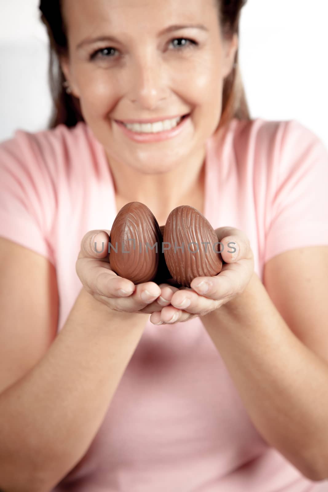 20-25, background, caucasian, decoration, easter, egg, event, felicity, female, giving, hand, handmade, happy, holding, hope, human, life, model, old, one, palm, people, person, portrait, property, releases, seasonal, show, showing, smile, smiling, studio, symbol, traditional, white, woman, years, young