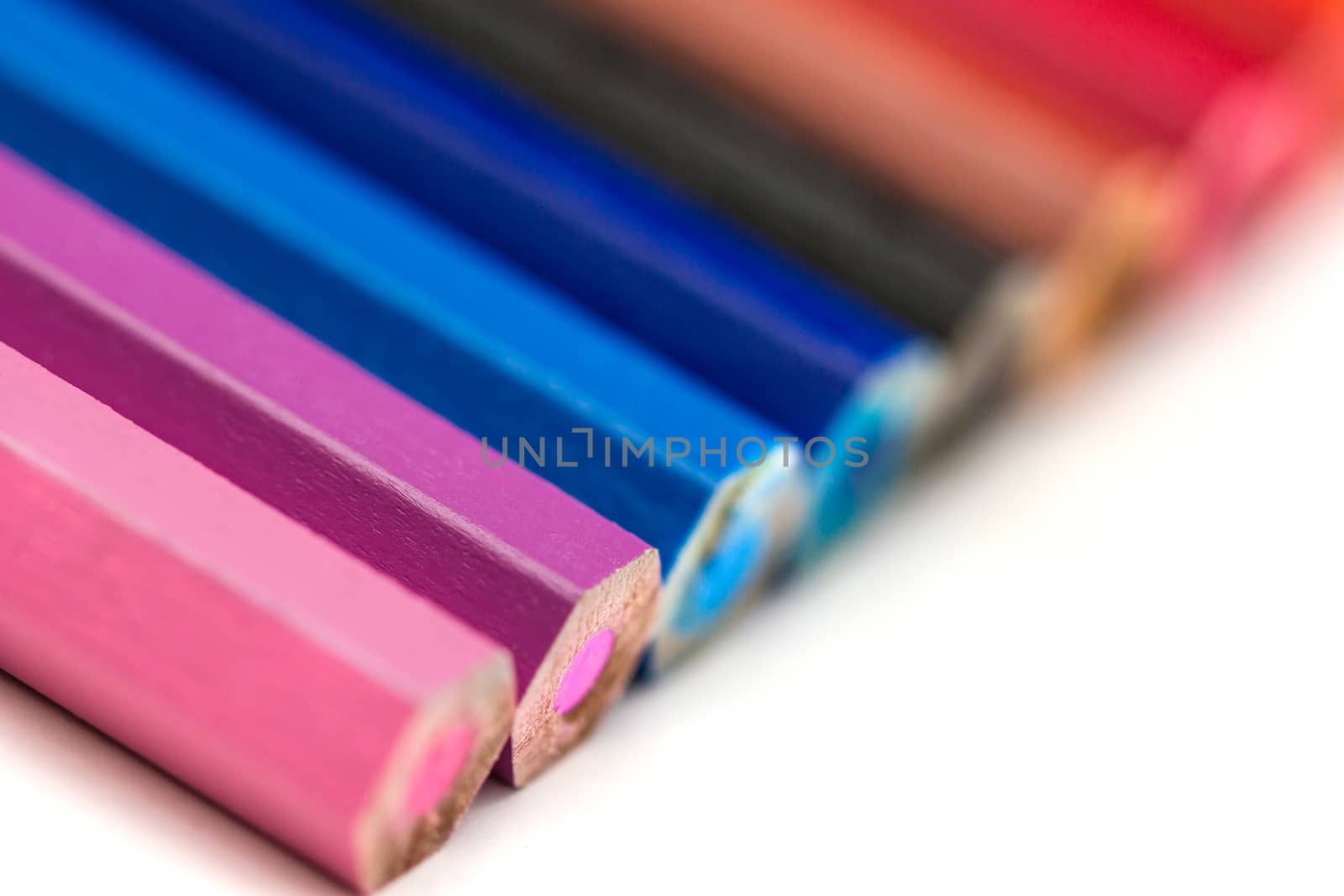 Set of color pencils isolated on white background by maggee