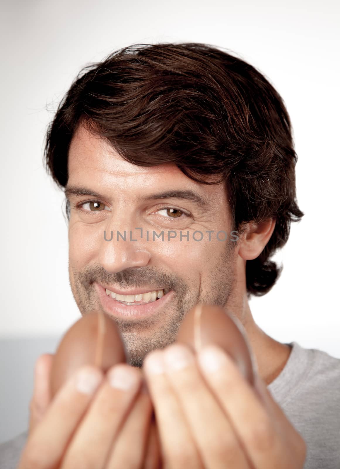 25-30, background, caucasian, decoration, easter, egg, event, felicity, giving, hand, handmade, happy, holding, hope, human, life, male, man, model, old, one, palm, people, person, portrait, property, releases, seasonal, show, showing, smile, smiling, studio, symbol, traditional, white, years, young