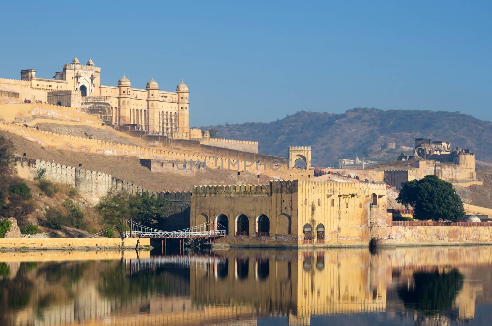 Amber fort reflection over the lake, Jaipur, Rajasthan, India 