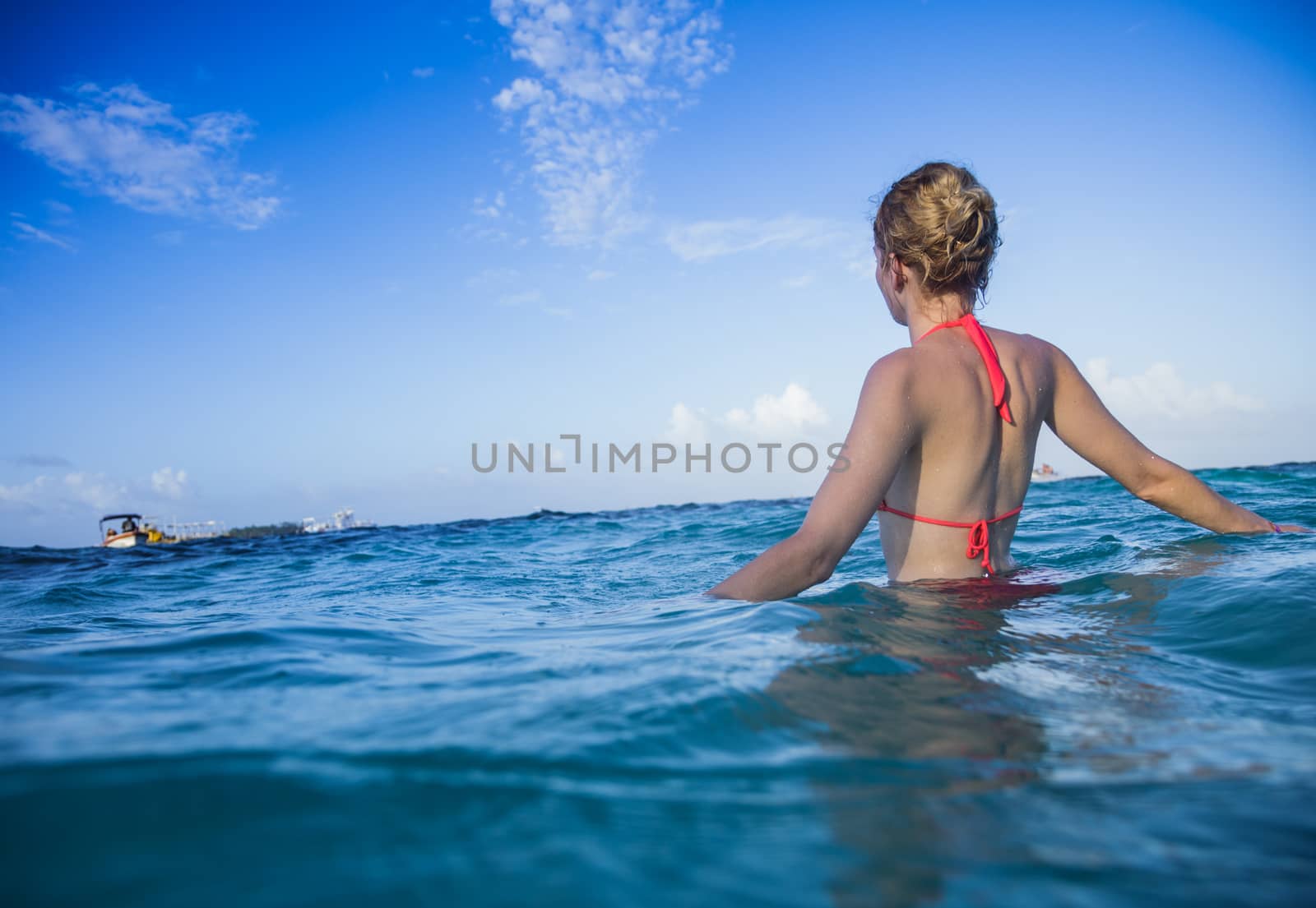 Woman at the Sea Enjoying the hot Water by aetb