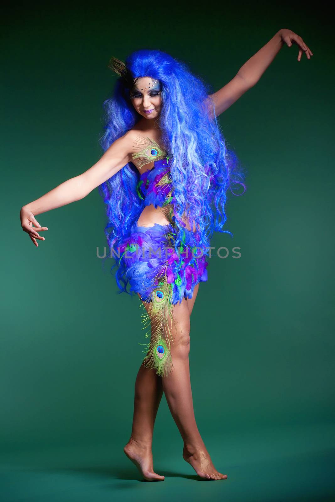 Woman in Blue Wig and Dress of Feathers by courtyardpix