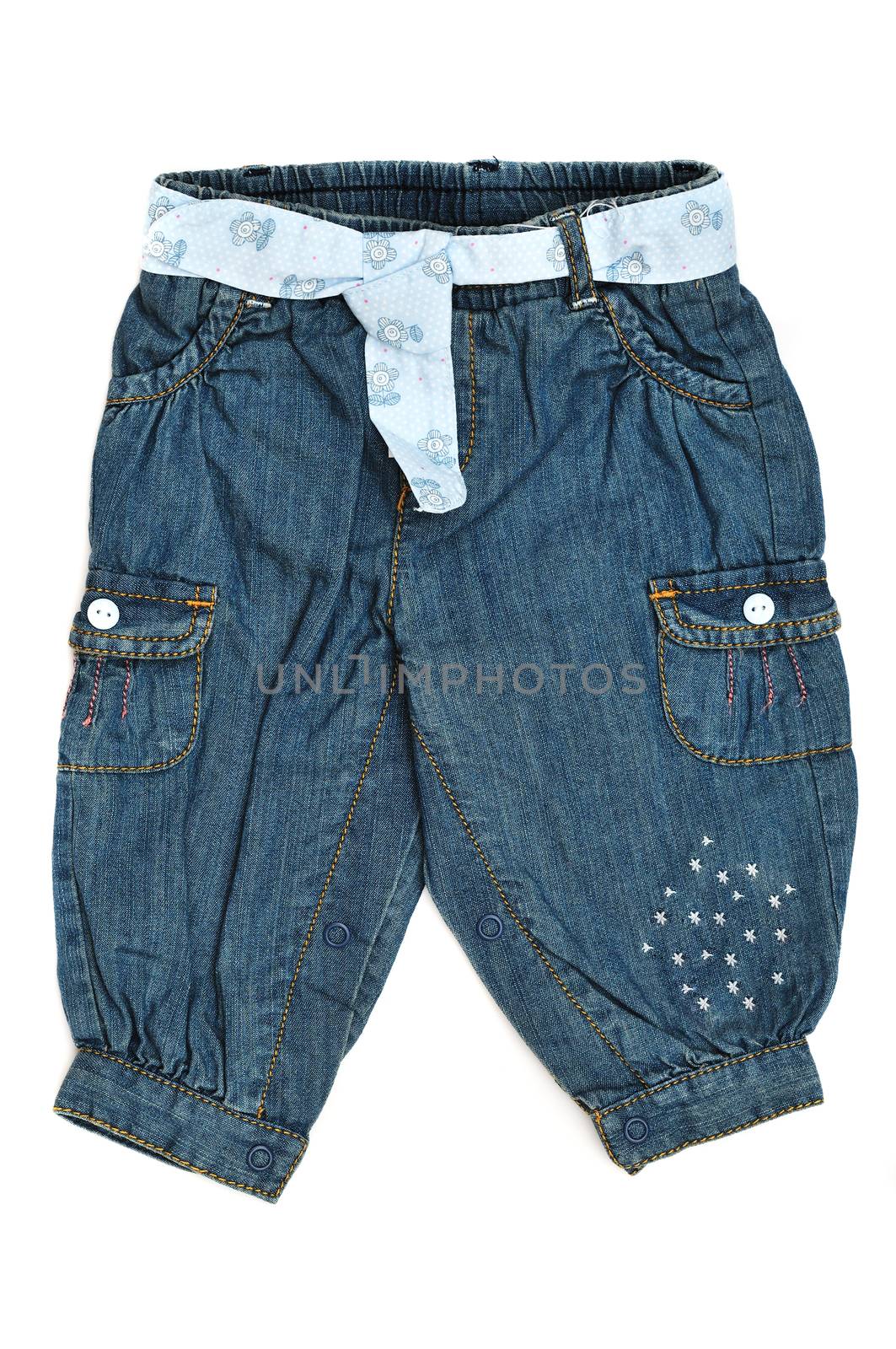 Baby jeans with pockets over the white background 
