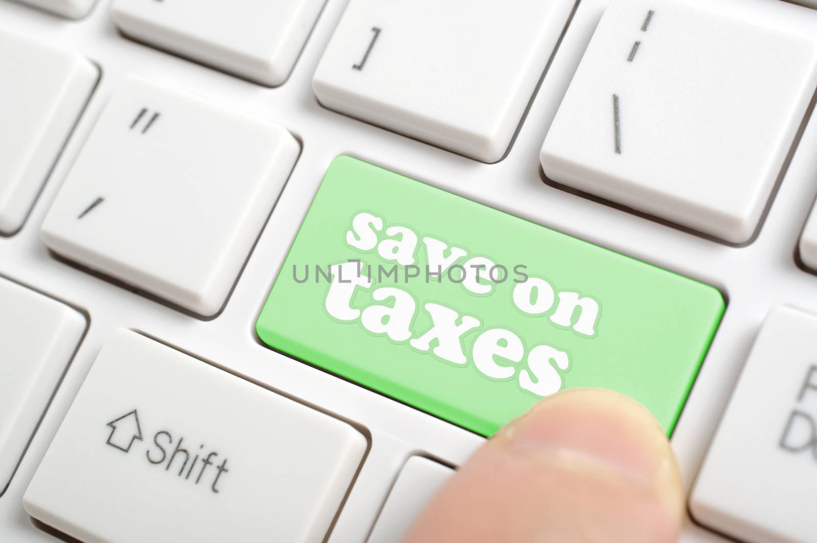 Pressing save on taxes key on keyboard by payphoto