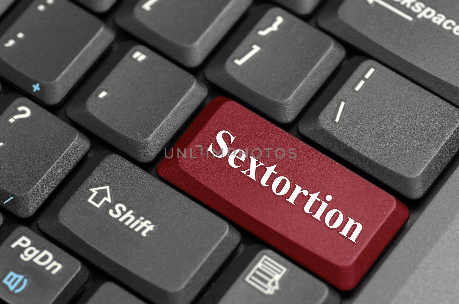 Sextortion key on keyboard by payphoto