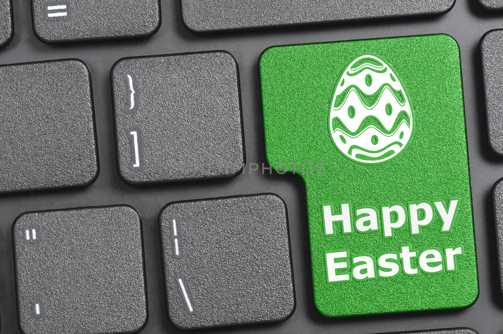 Happy easter key on keyboard by payphoto