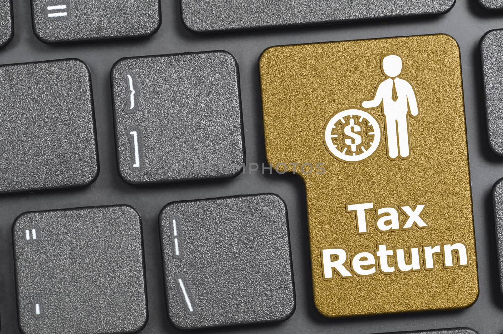 Tax return key on keyboard by payphoto