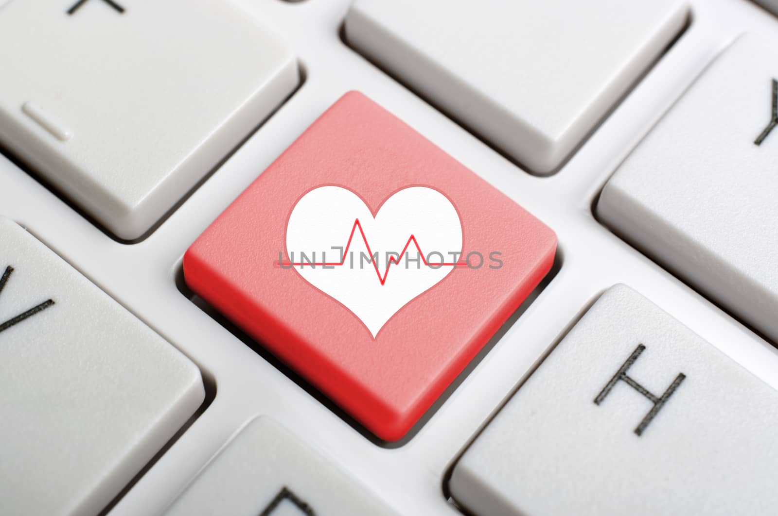 Heart pluse key on keyboard by payphoto