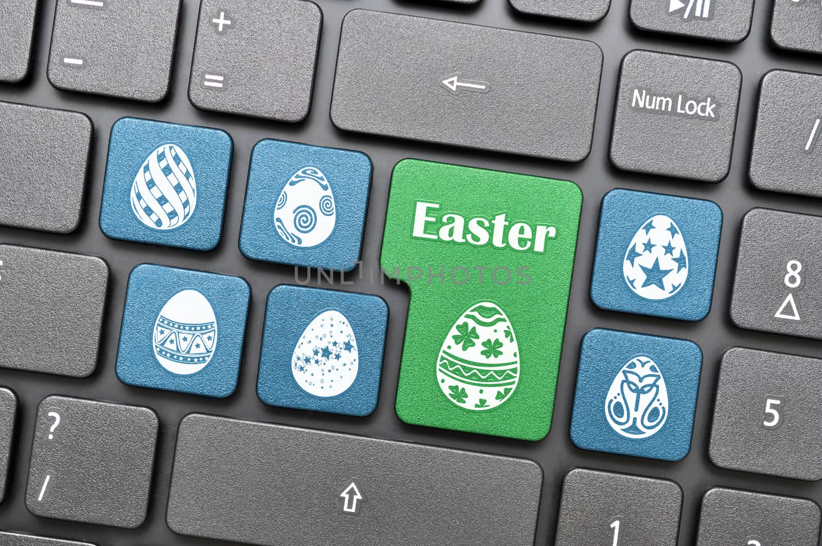 Blue and green easter egg on keyboard