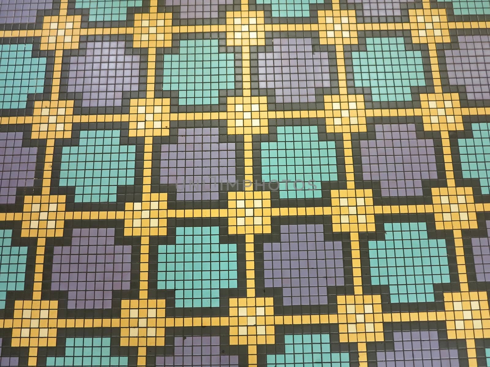 Squares of yellow, black, purple and turquoise