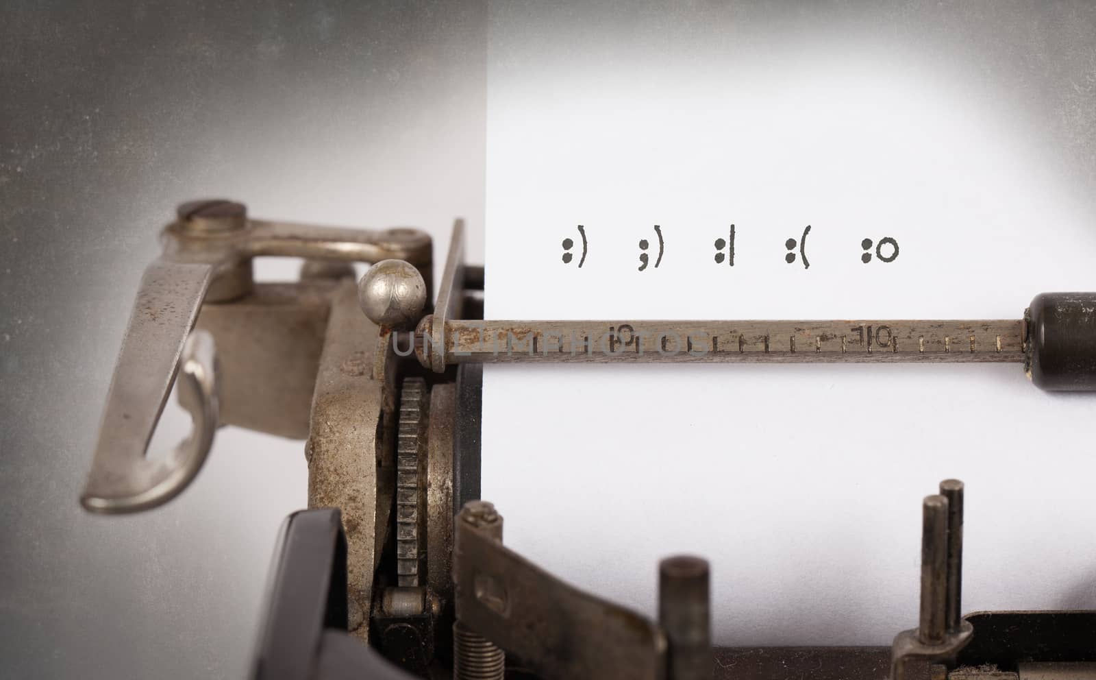 Close-up of an old typewriter with paper, perspective, selective focus, smileys