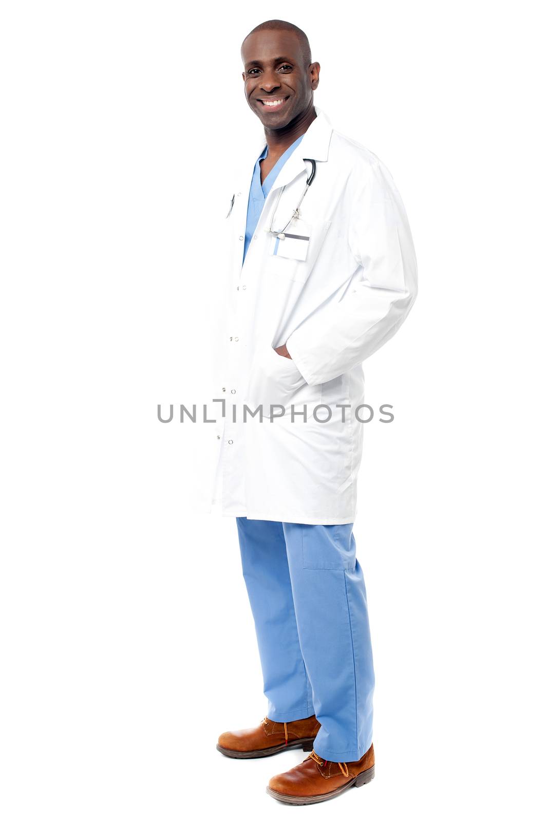 Smart male doctor standing, isolated on white