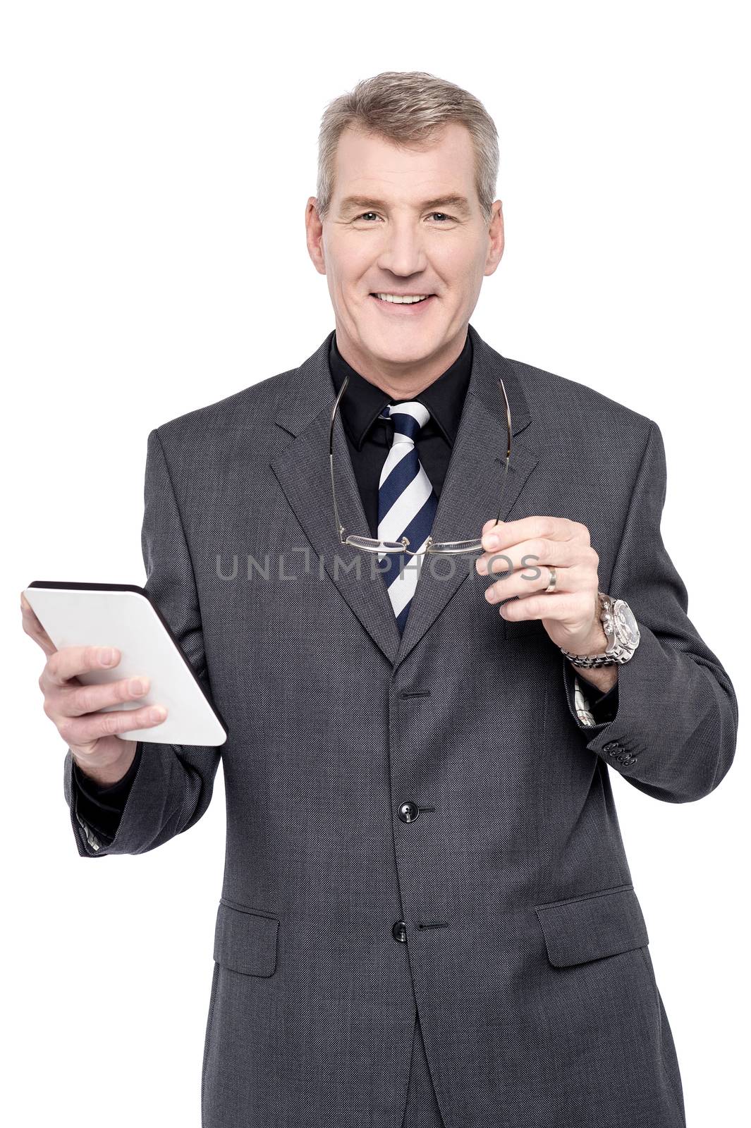 Happy businessman posing with digital tablet