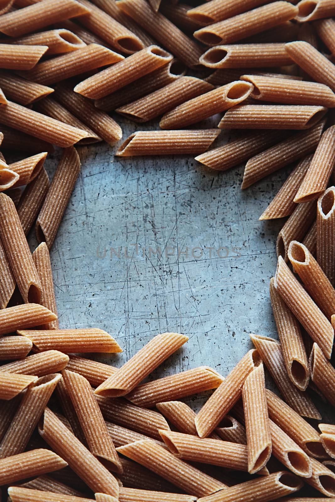 Dry pasta on aluminum by Sandralise