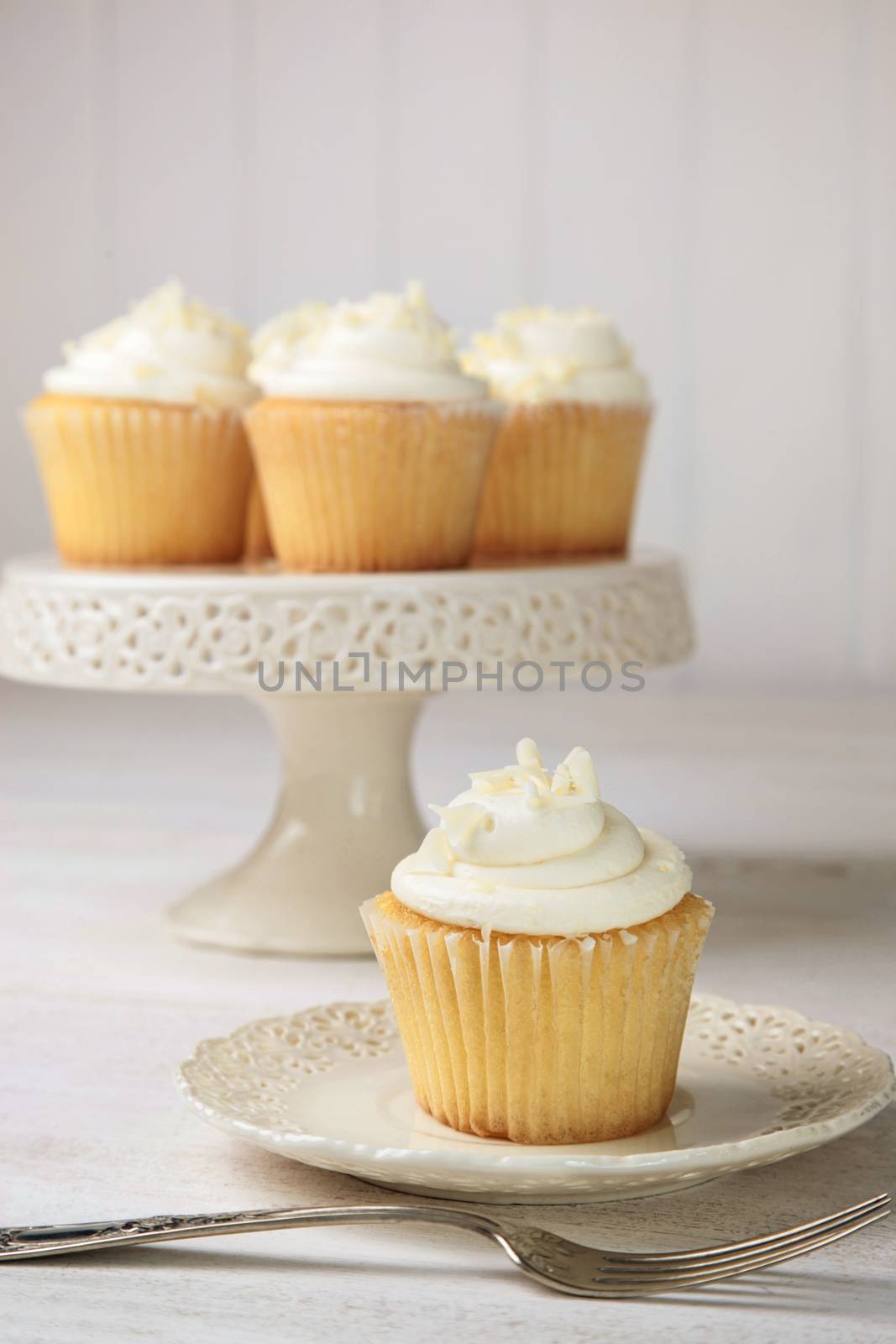 Sweet vanilla cupcakes ready to eat