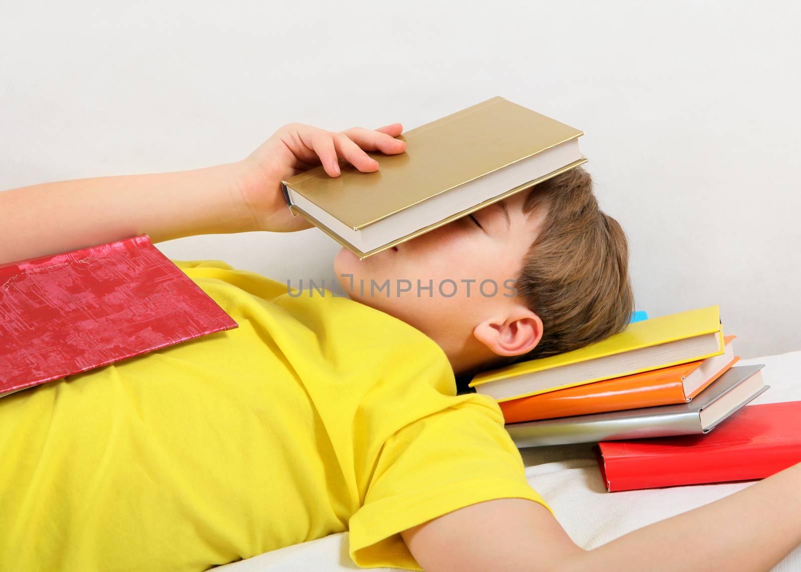 Teenager sleep with a Books by sabphoto