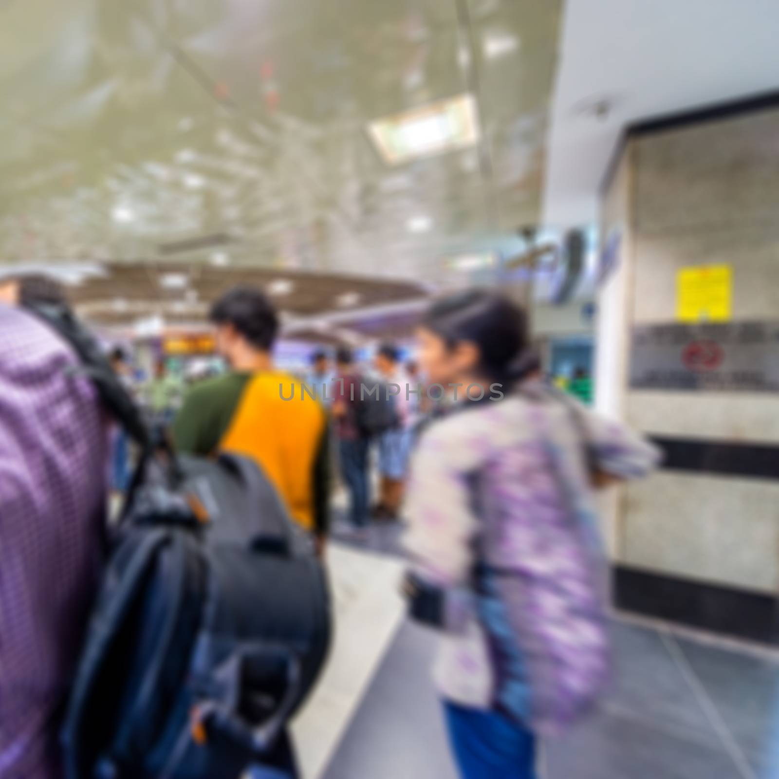 Blurred background of passenger walk at subway station