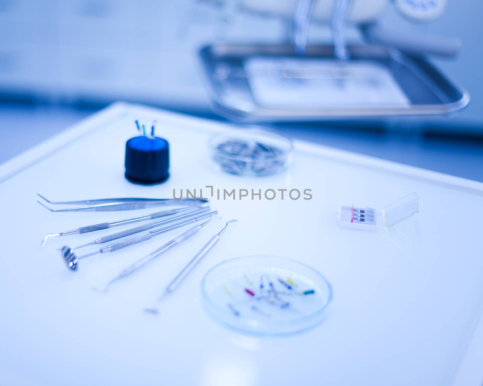 Dental instruments and tools in a dentists office by JanPietruszka