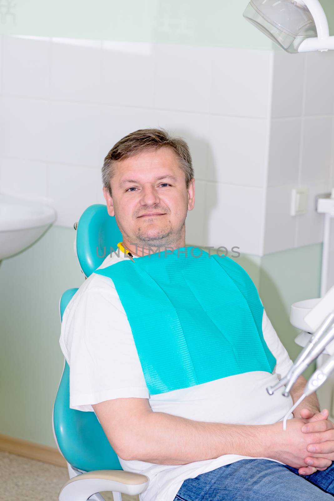 Portrait of a man in dentist office